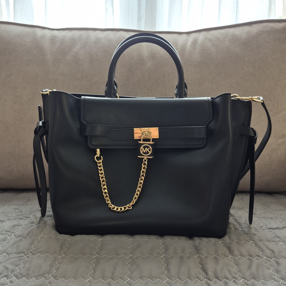 Michael Kors Black and Gold Satchel with Structured Design